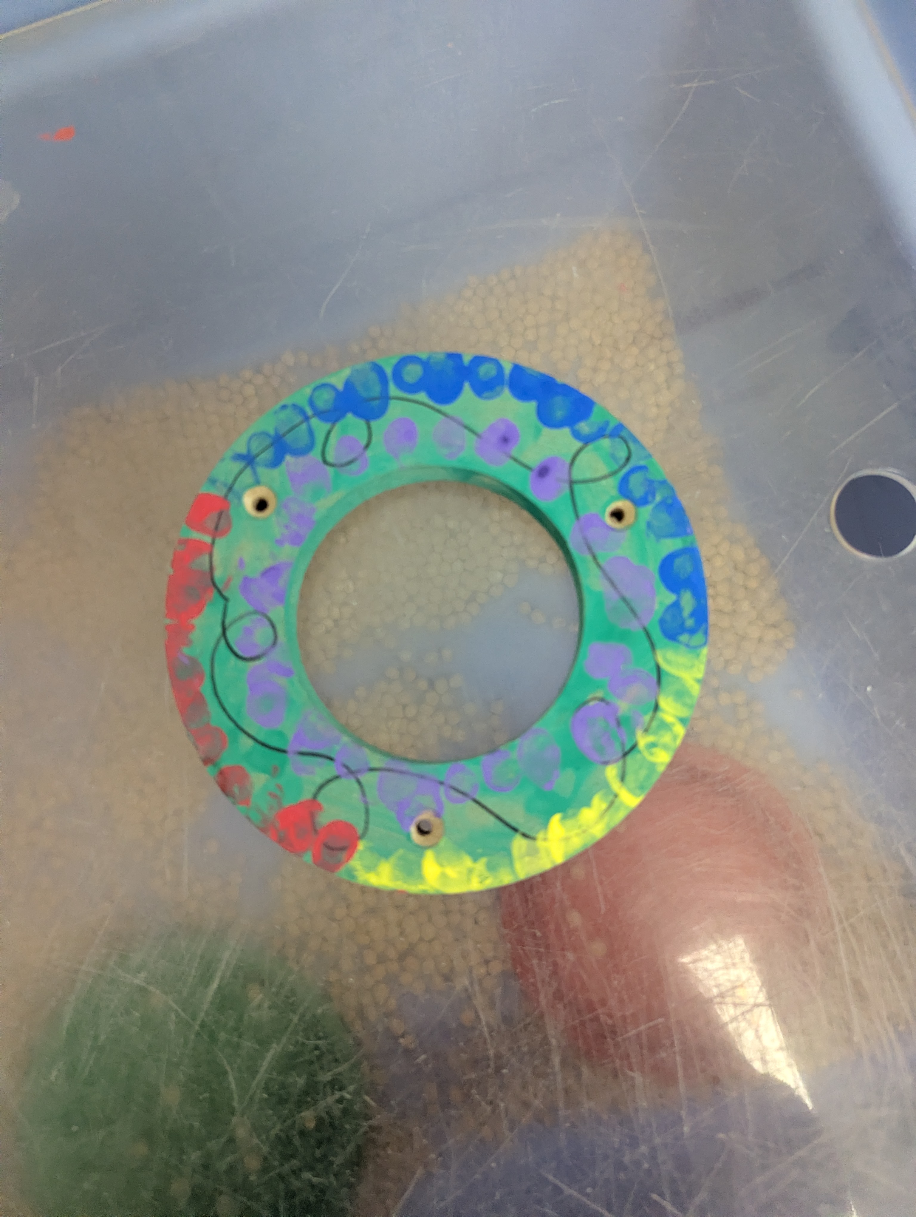 Fingerprint holiday wreath created as a student family gift